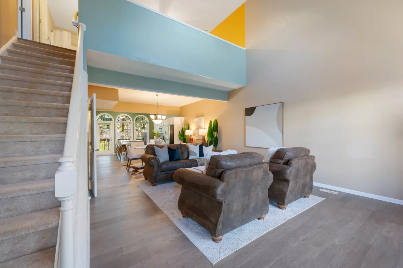 Open living room photographed for a real estate listing